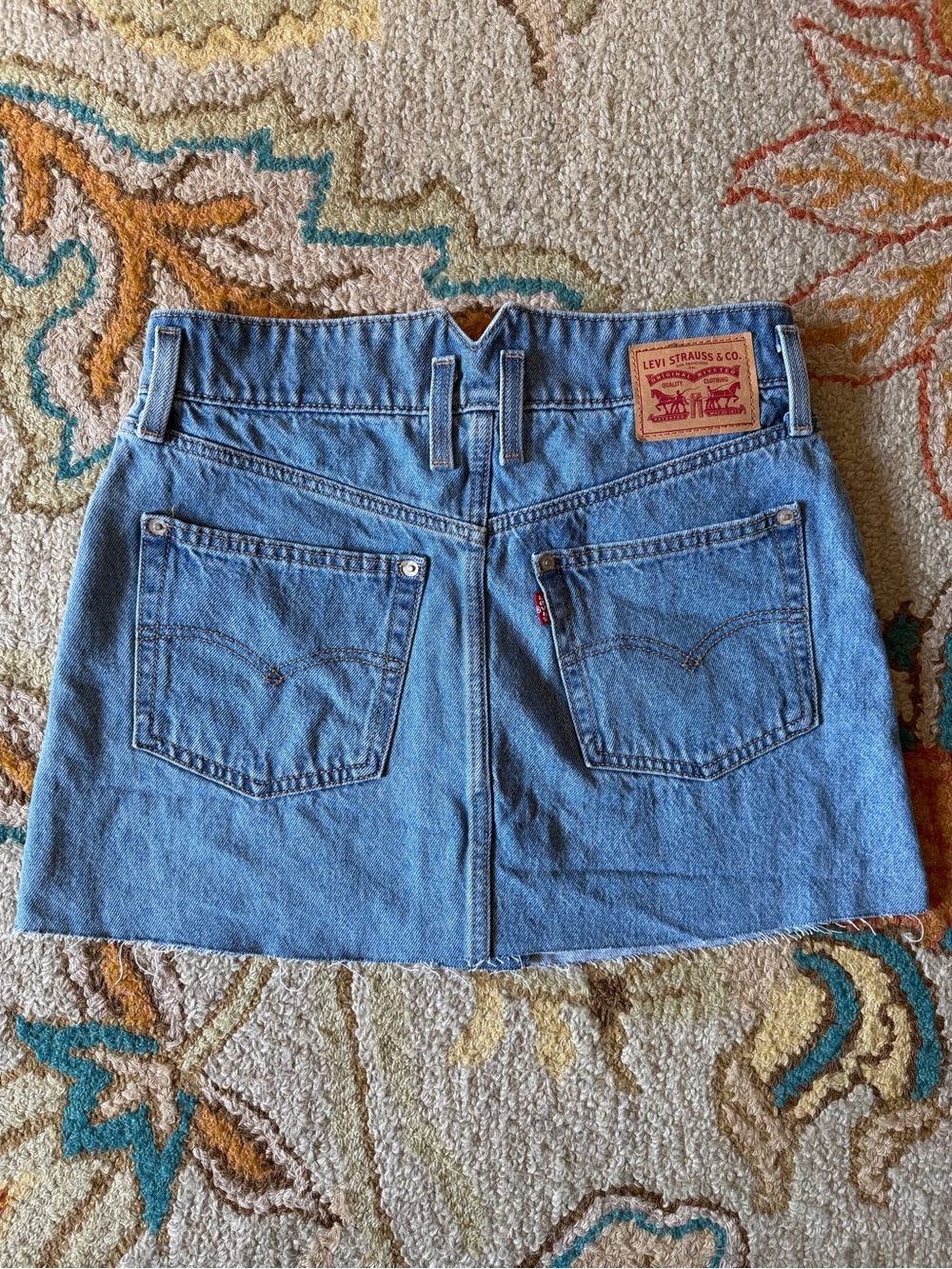 Levi's Light Wash Denim Mini Skirt with Raw Edge Frayed Hem Waist 28” Retro Boho